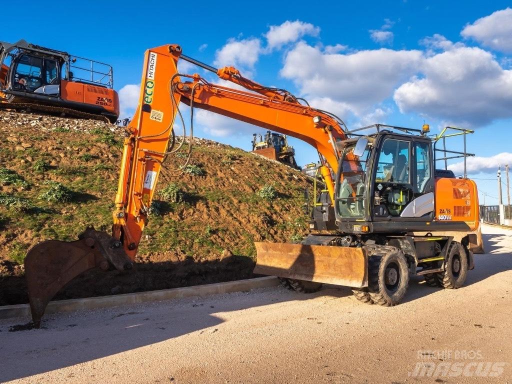 Hitachi 140W Колісні екскаватори