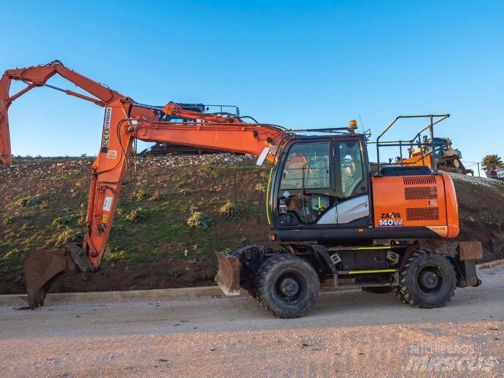 Hitachi 140W Колісні екскаватори