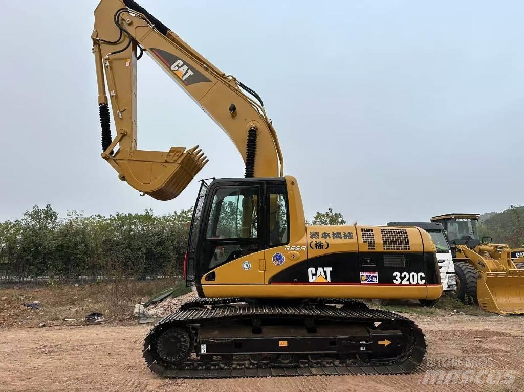 CAT 320 C Гусеничні екскаватори