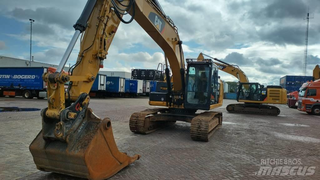 CAT 323 EL Гусеничні екскаватори