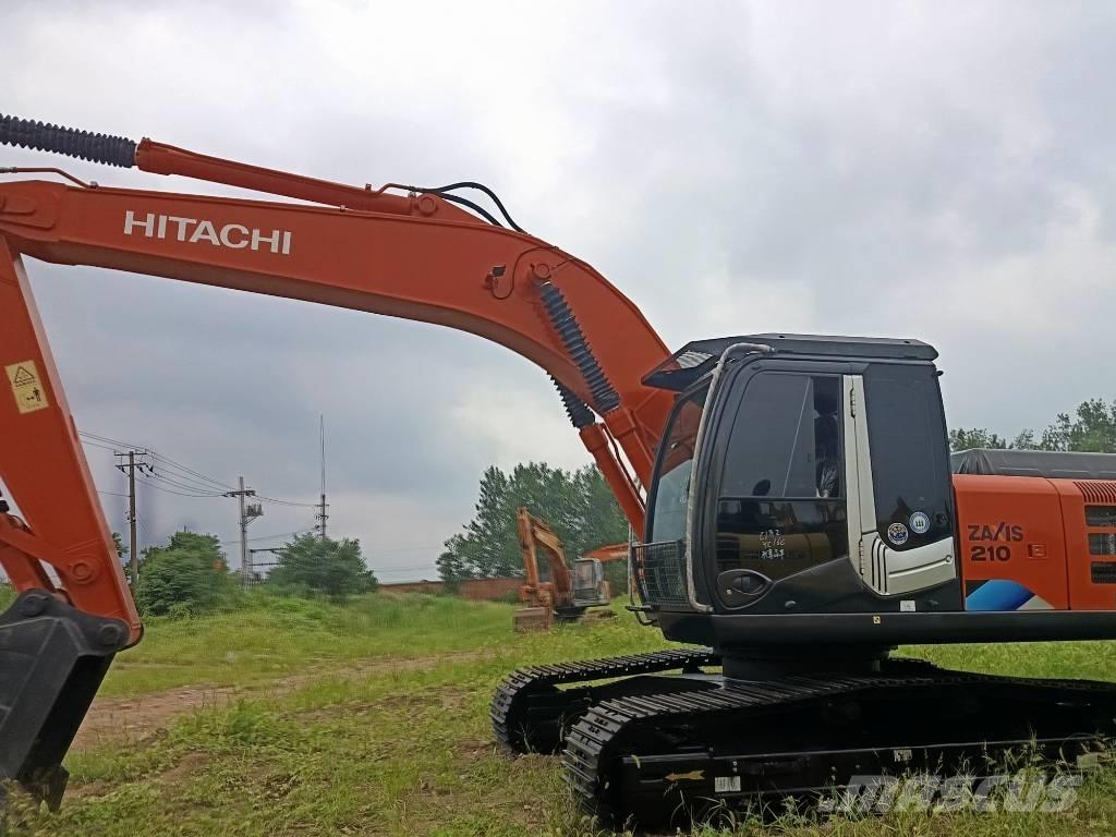 Hitachi ZX 210 Гусеничні екскаватори