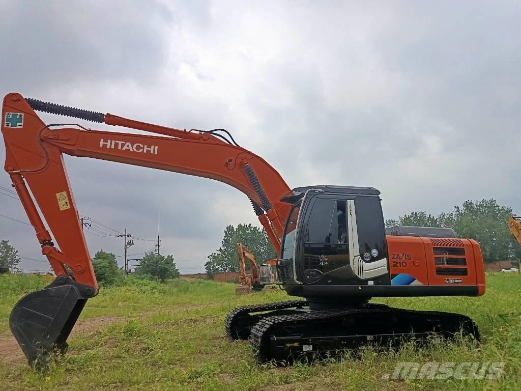 Hitachi ZX 210 Гусеничні екскаватори