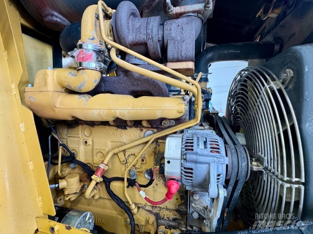 CAT 432 D Екскаватори-навантажувачі