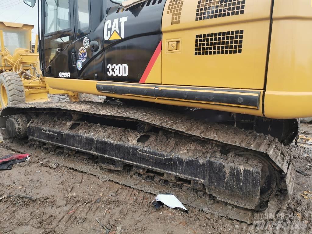 CAT 330DL Гусеничні екскаватори
