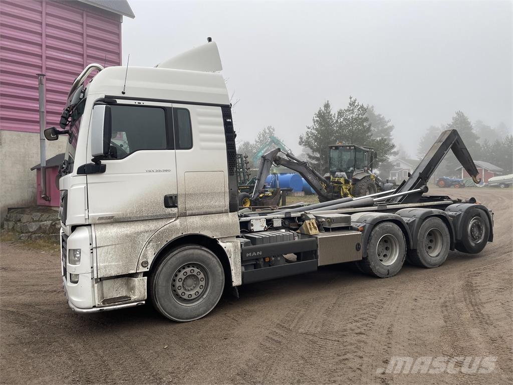 MAN TGX 35.580 Вантажівки з гаковим підйомом