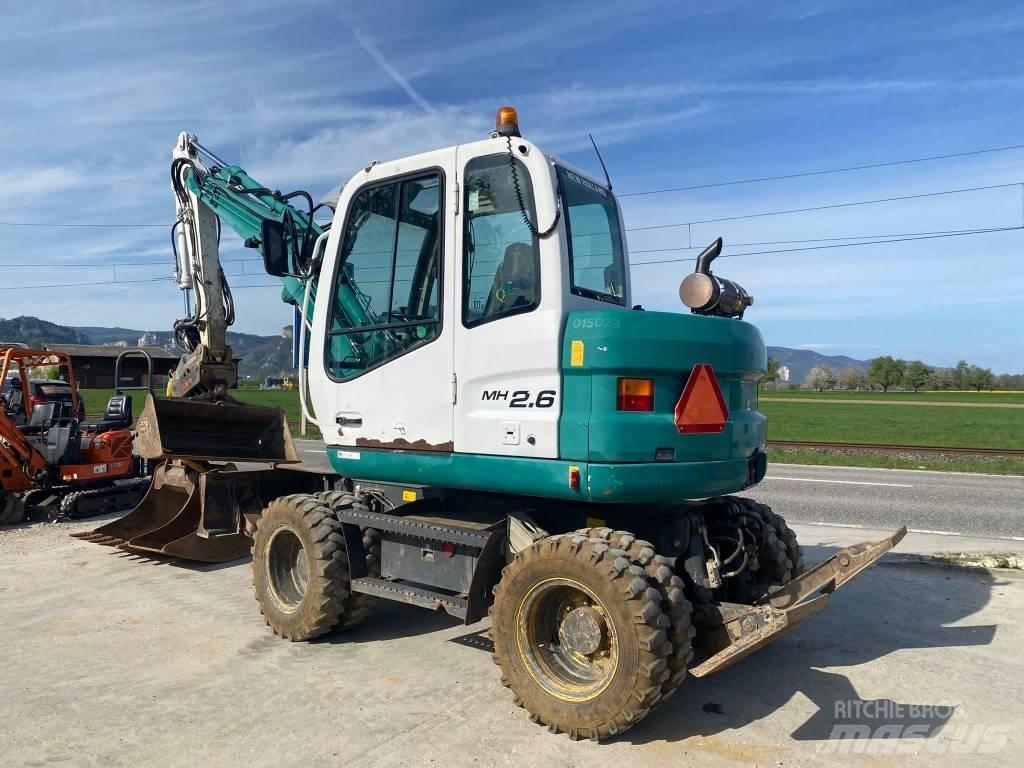 New Holland MH 2.6 Колісні екскаватори