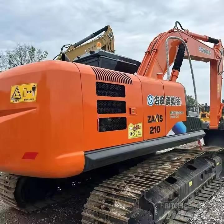 Hitachi ZX210 Гусеничні екскаватори