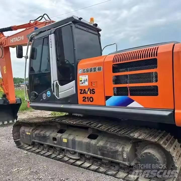 Hitachi ZX210 Гусеничні екскаватори