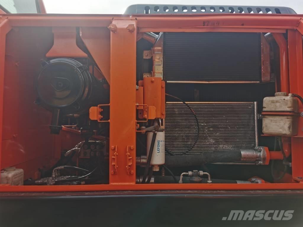 Doosan DX225LC-9C Гусеничні екскаватори