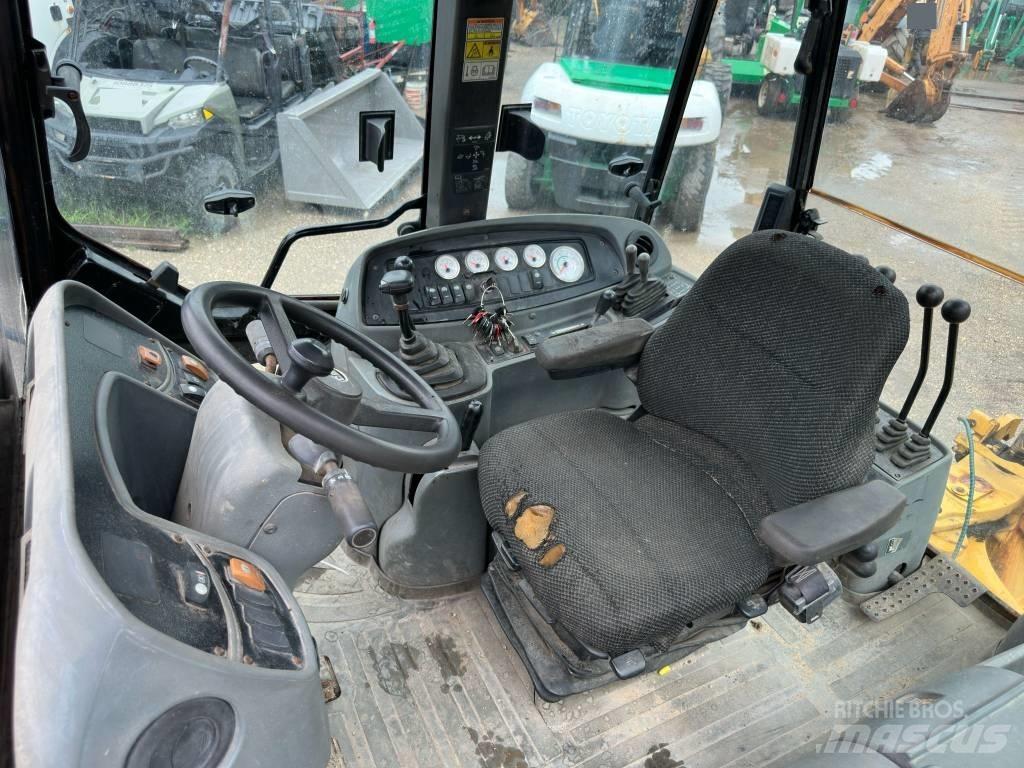 CAT 446 D Екскаватори-навантажувачі
