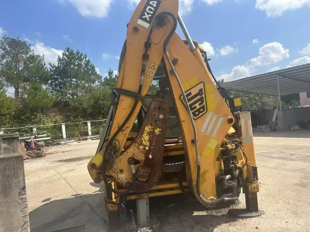 JCB 4 CX Гусеничні екскаватори