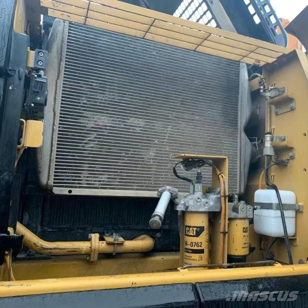CAT 329 Гусеничні екскаватори