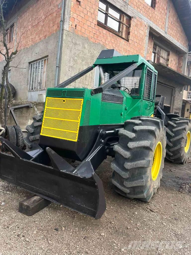 Timberjack 450C Трельовочні трактора