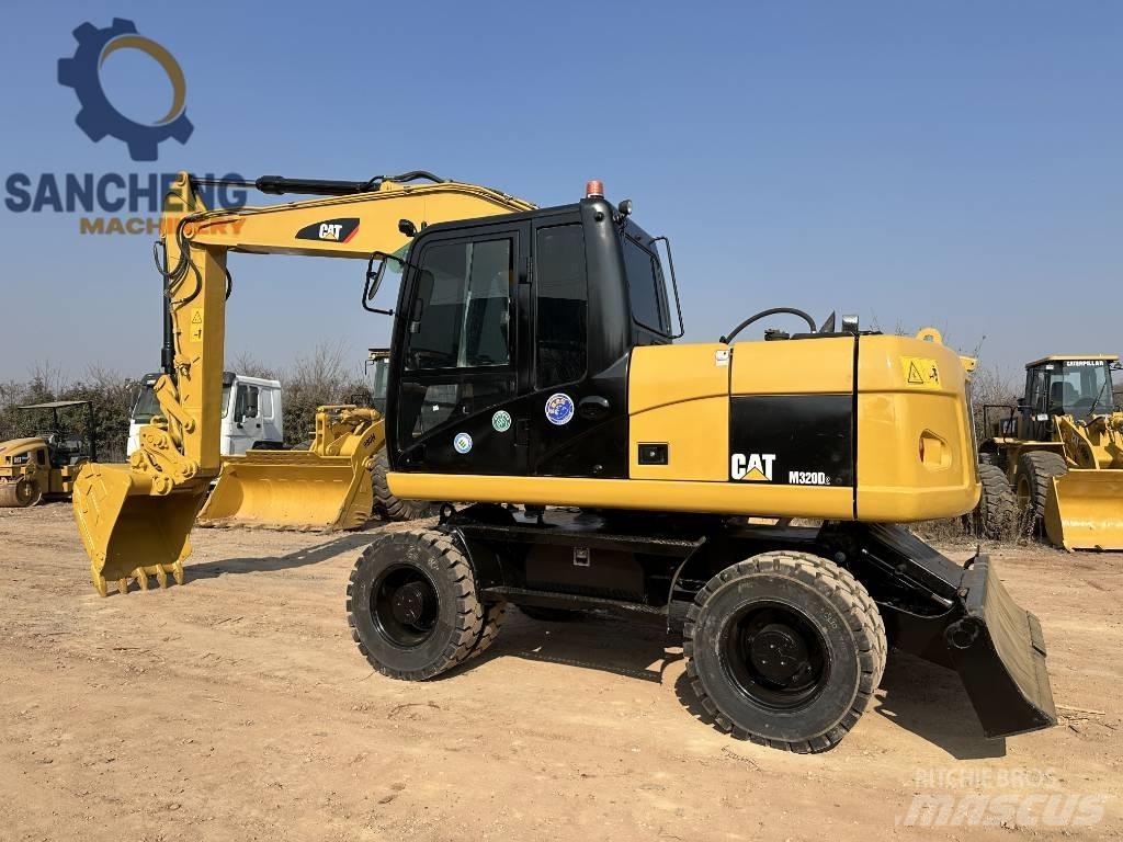CAT M 320 D Колісні екскаватори