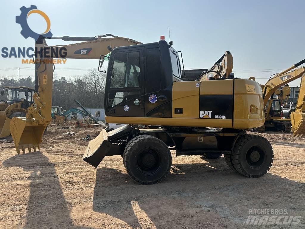 CAT M 320 D Колісні екскаватори