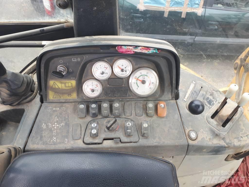CAT 428 D Екскаватори-навантажувачі