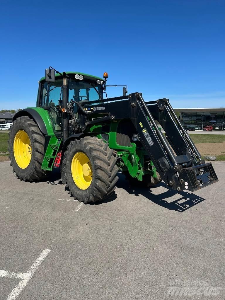 John Deere 7530 Трактори