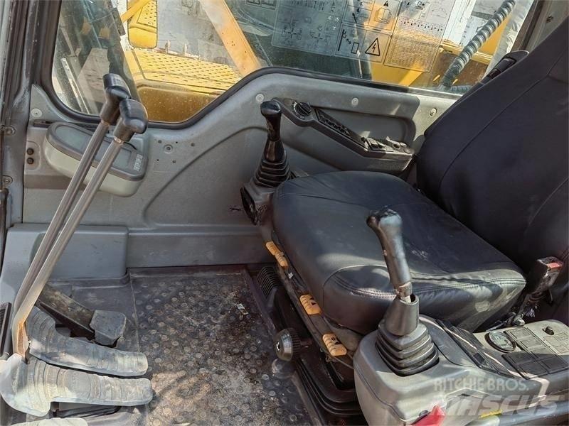 Volvo EC210B Гусеничні екскаватори