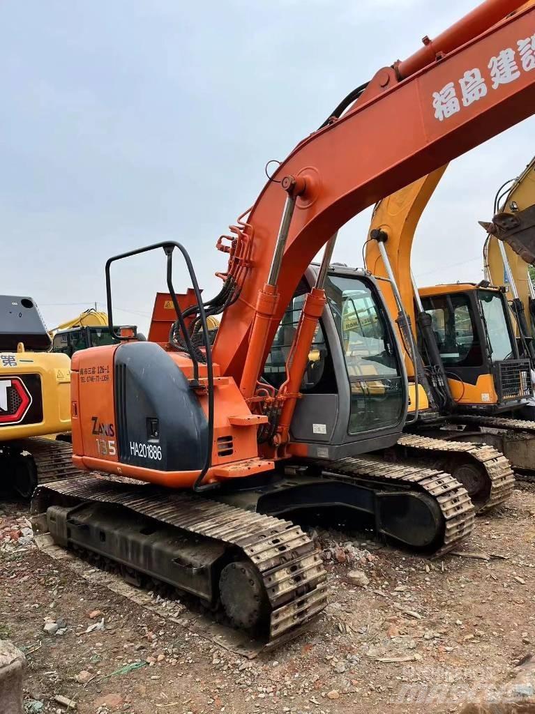 Hitachi ZX 135 US Гусеничні екскаватори