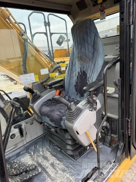 CAT 323 E Гусеничні екскаватори