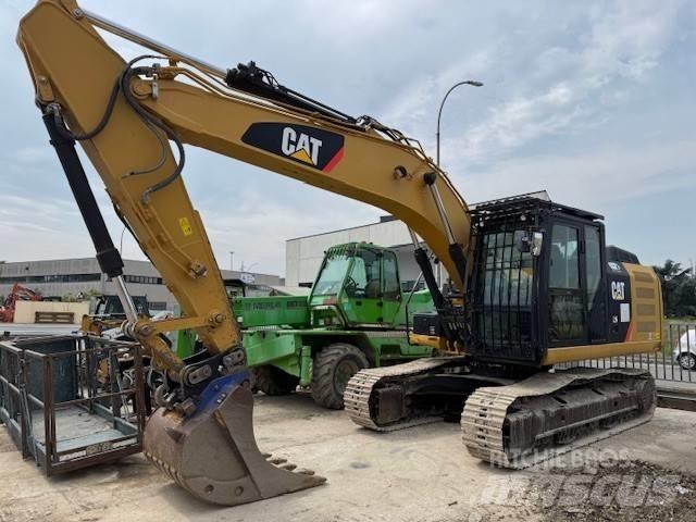 CAT 323 E Гусеничні екскаватори