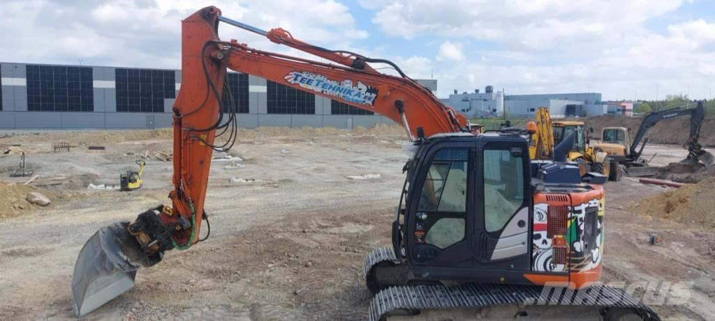 Hitachi ZX 135 US-6 Гусеничні екскаватори