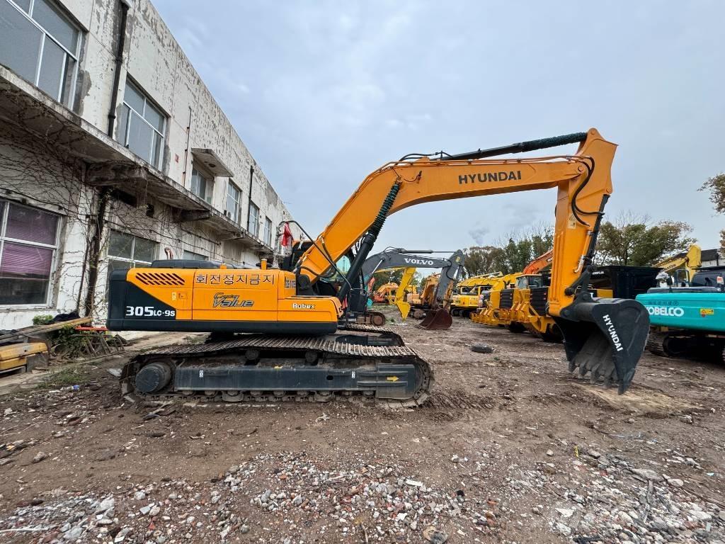 Hyundai 305lc Гусеничні екскаватори