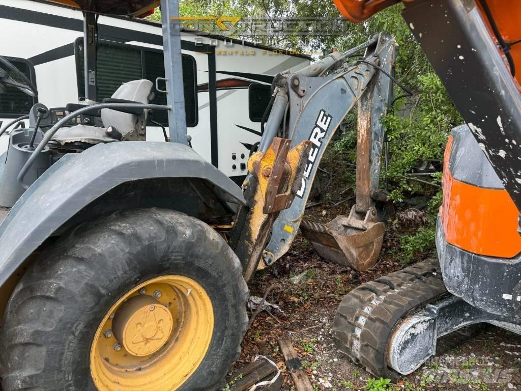DEERE 310J Екскаватори-навантажувачі