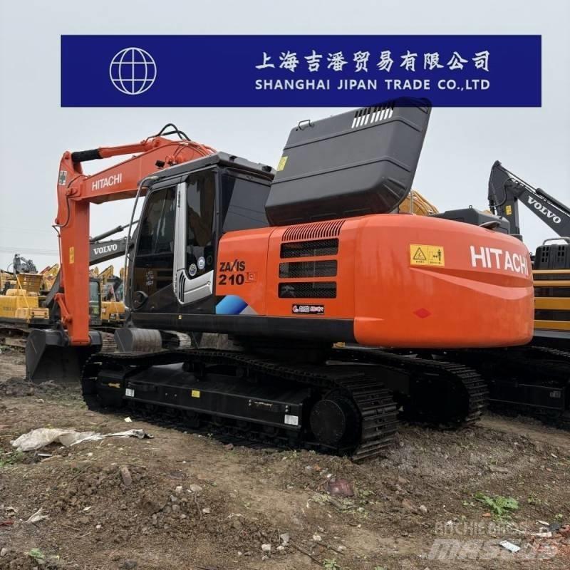 Hitachi ZX 210 Гусеничні екскаватори