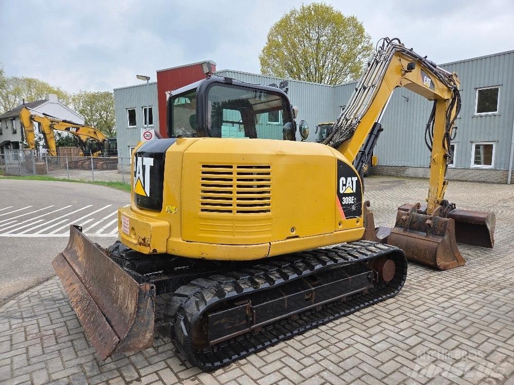 CAT 308E Середні екскаватори 7т. - 12т.