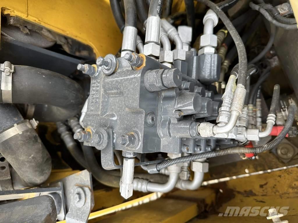 Komatsu PC78US Середні екскаватори 7т. - 12т.