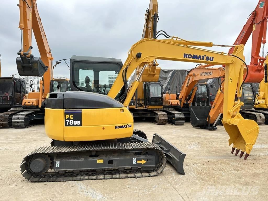 Komatsu PC78US Середні екскаватори 7т. - 12т.