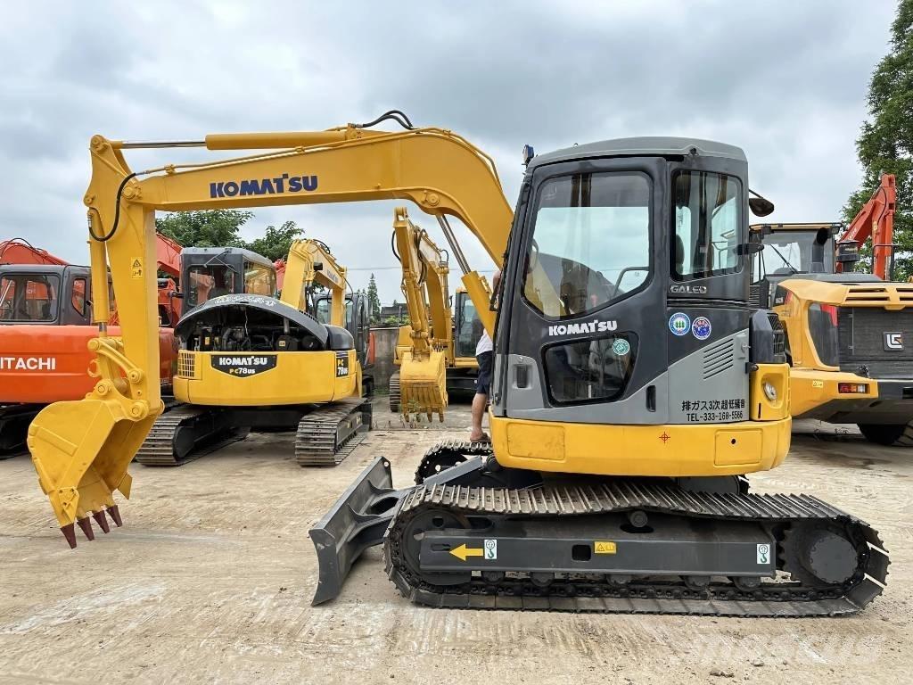 Komatsu PC78US Середні екскаватори 7т. - 12т.