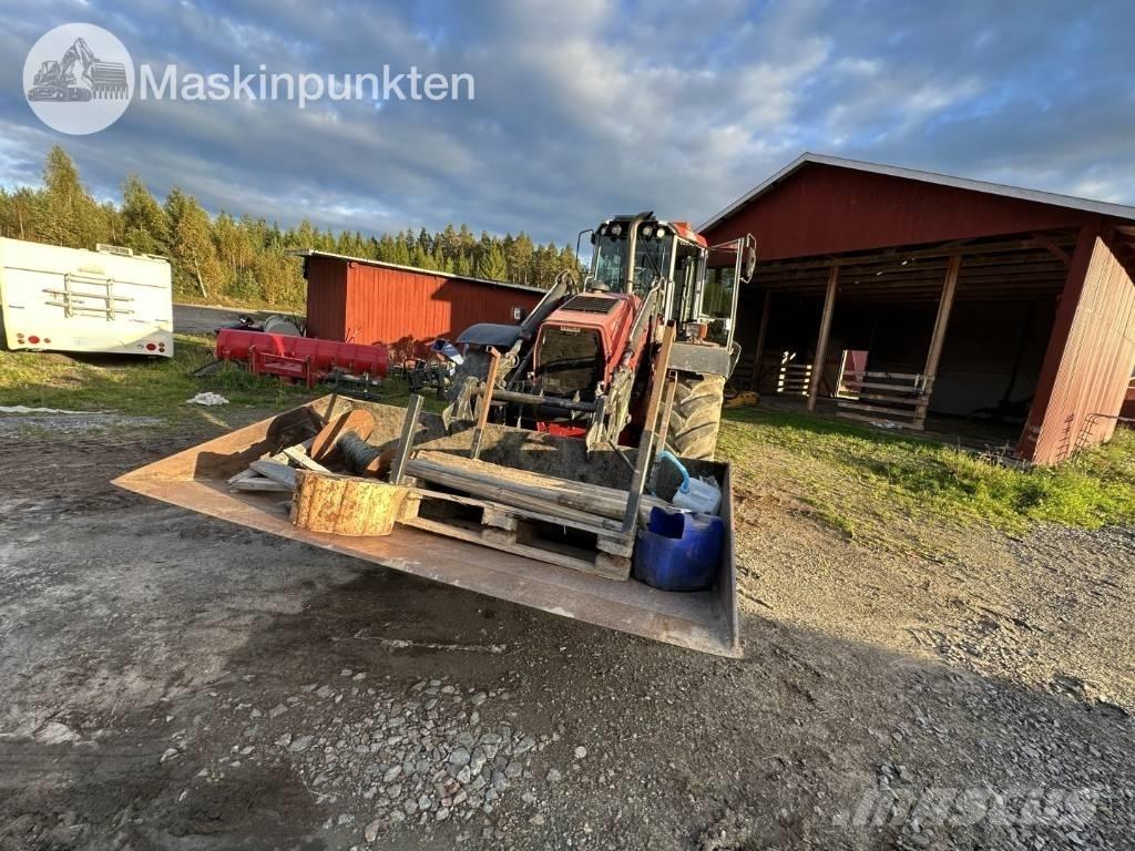 Huddig 1260 B Екскаватори-навантажувачі