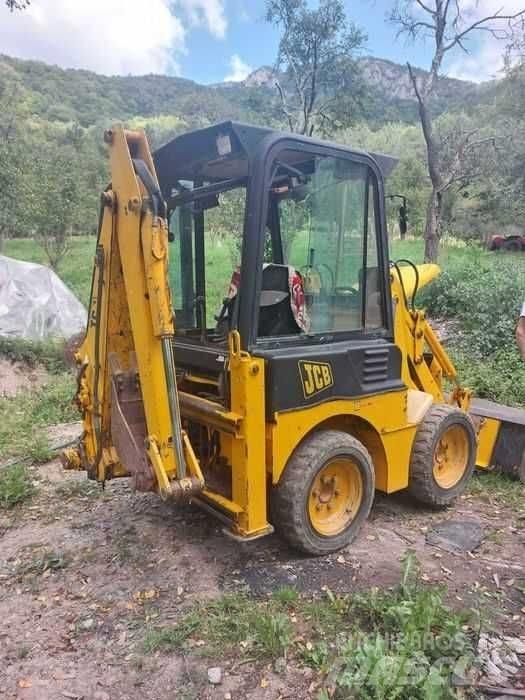 JCB 1 CX Екскаватори-навантажувачі