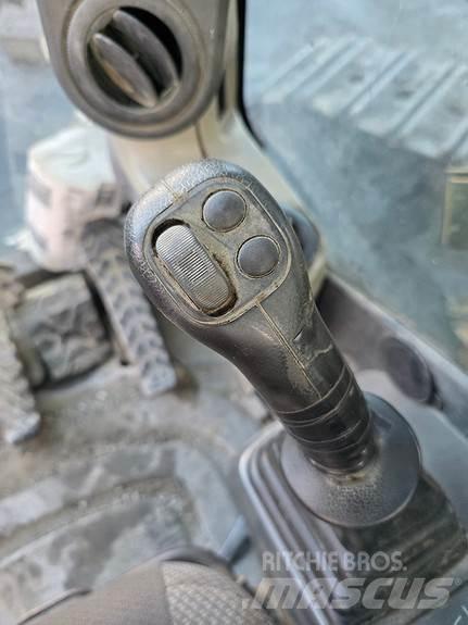 CAT 365C Гусеничні екскаватори