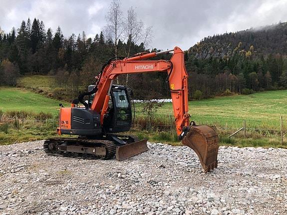 Hitachi ZX85US Гусеничні екскаватори