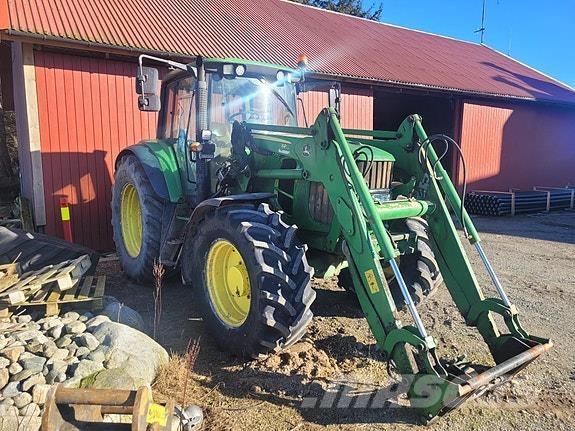 John Deere 6530 Трактори