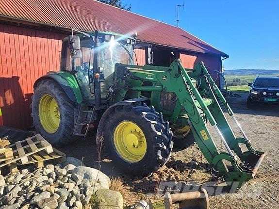 John Deere 6530 Трактори