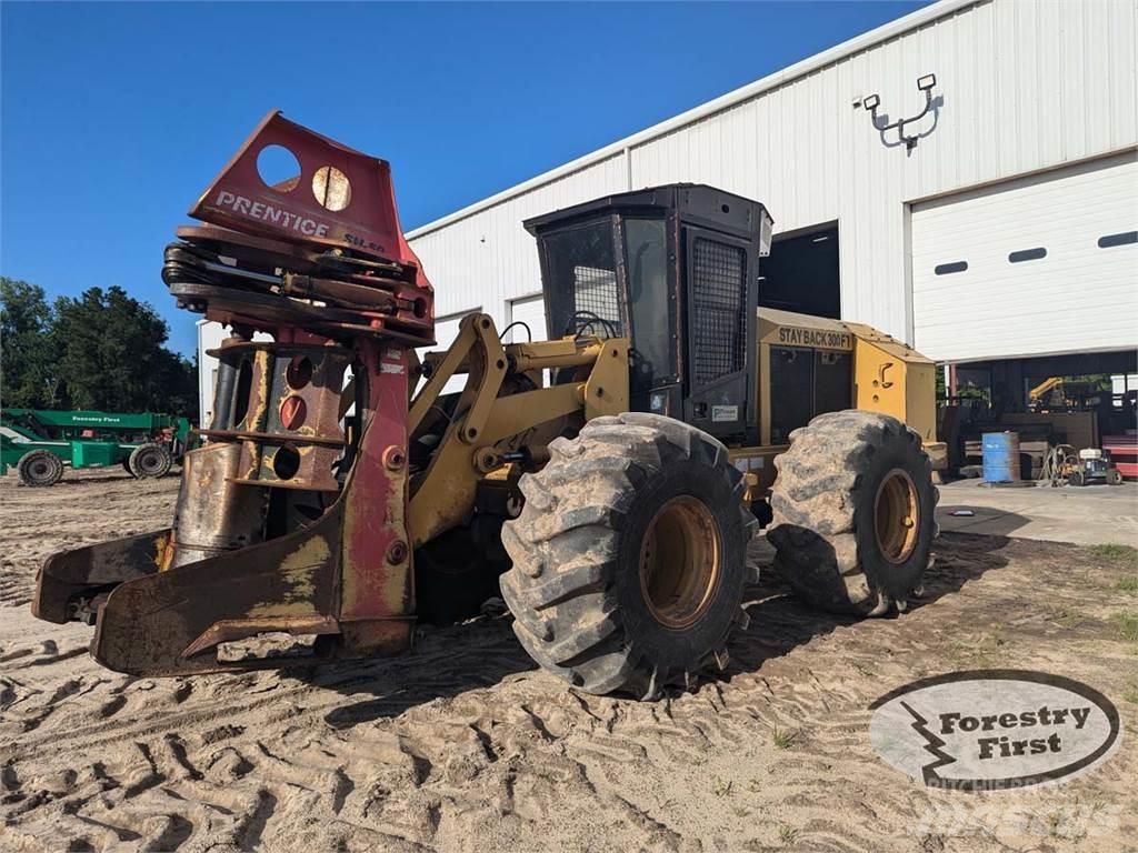 CAT 553 Валочно-пакетувальні машини