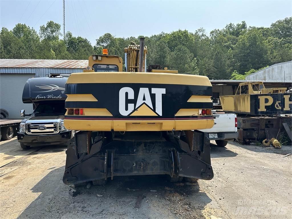 CAT M320 Колісні екскаватори