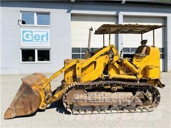 CAT 933F Гусеничні вантажники