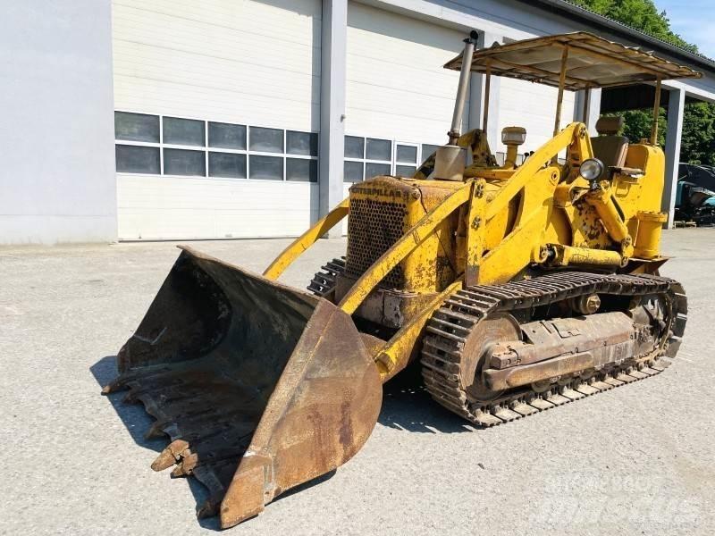 CAT 933F Гусеничні вантажники