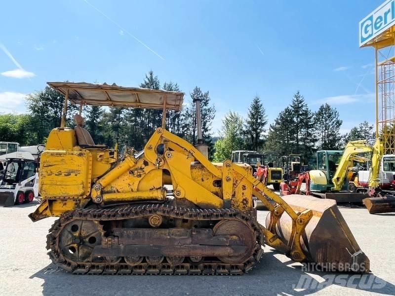 CAT 933F Гусеничні вантажники