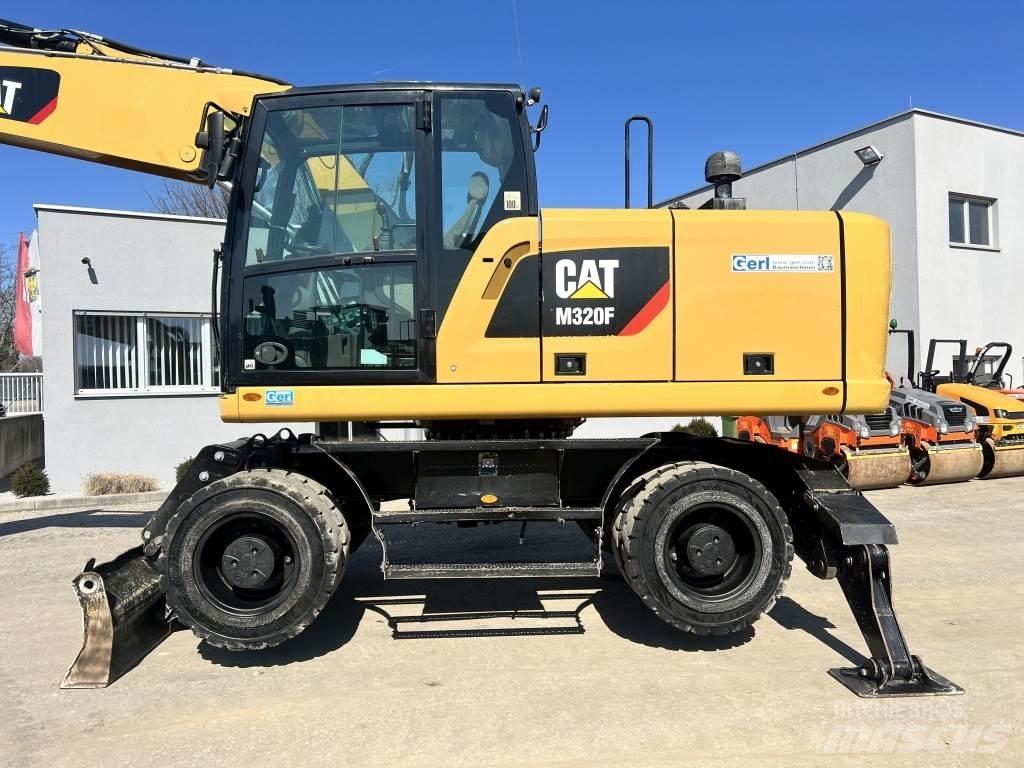 CAT M 320 F Колісні екскаватори