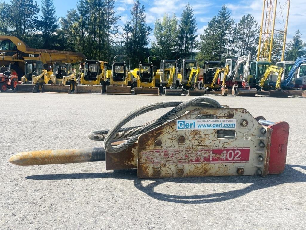  Huppi 402 Гідравлічні пальові молоти