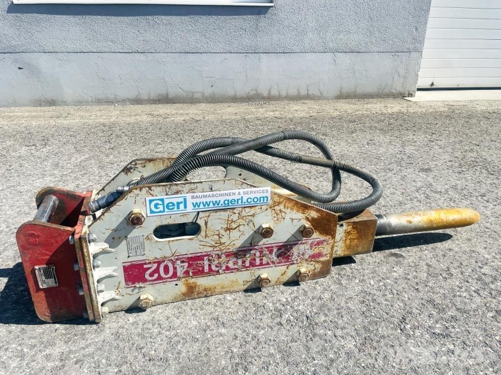  Huppi 402 Гідравлічні пальові молоти