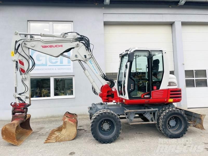 Takeuchi TB295W Колісні екскаватори