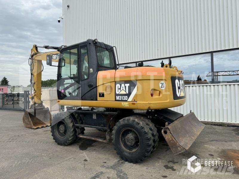 CAT M313D Колісні екскаватори