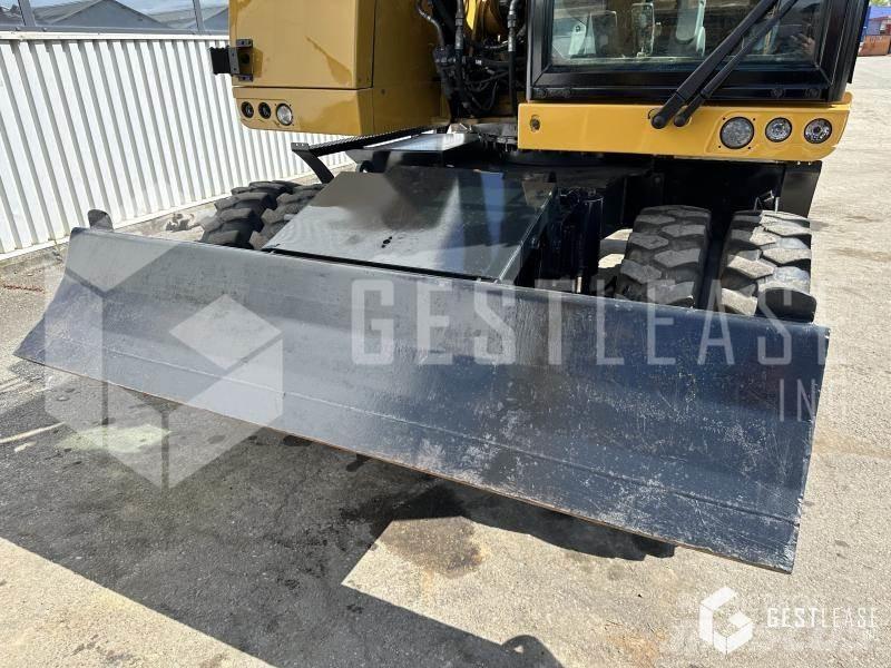 CAT M315F Колісні екскаватори